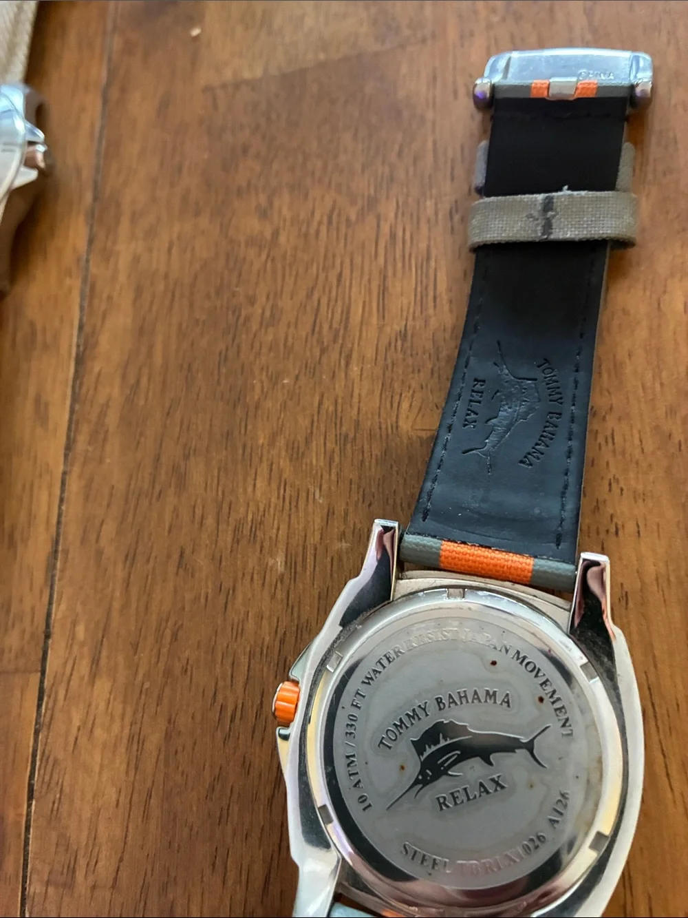 Tommy BAHAMA Orange and Gray Sport Watch with Canvas Strap. Water resistant